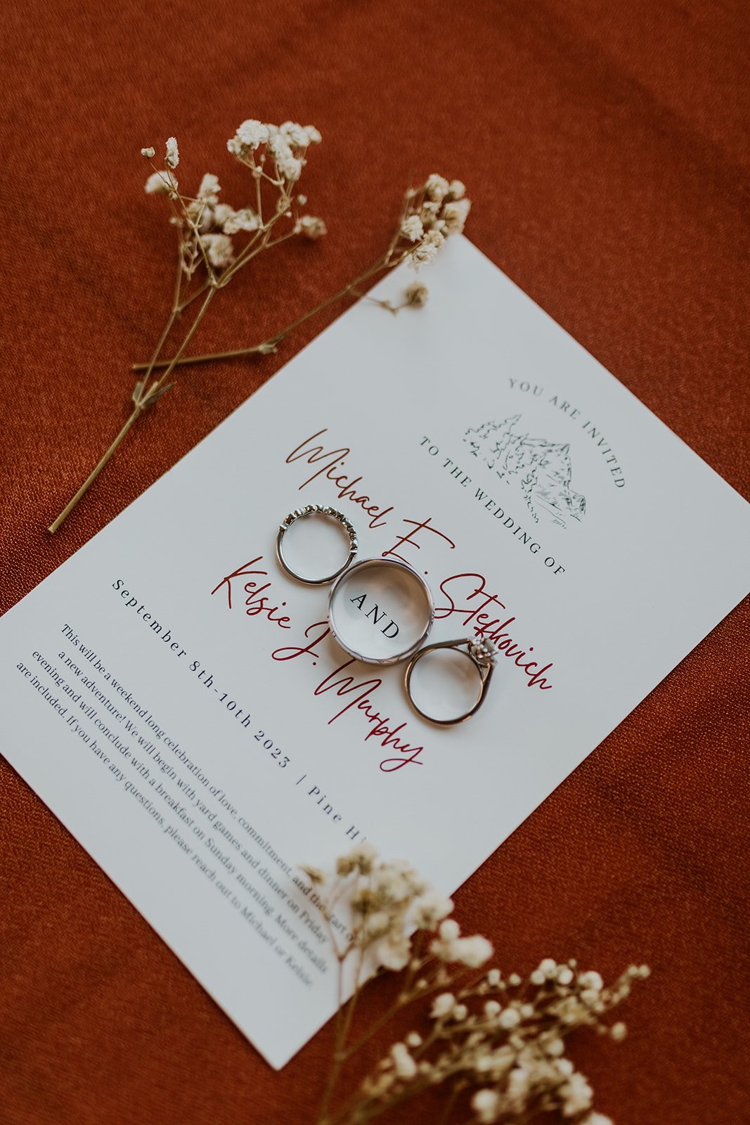Wedding bands decorated on the wedding stationary. 