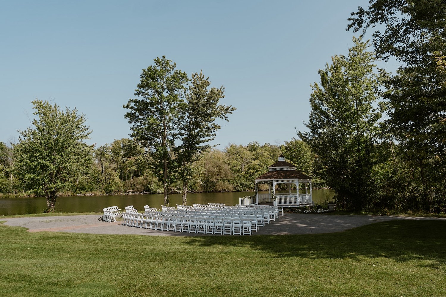 View of the wedding ceremony location over looking the water.