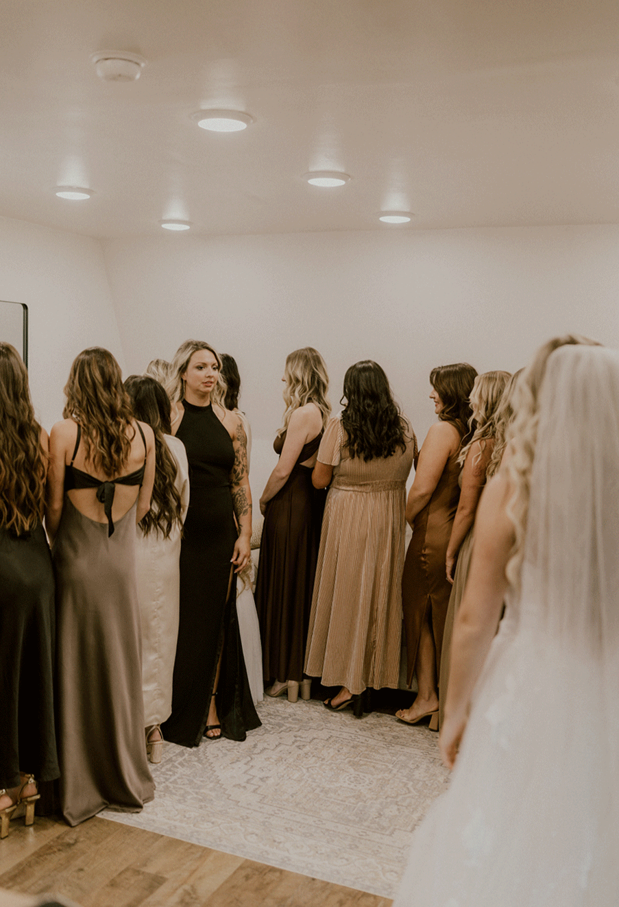 The bride shows her bridal part her first look in her wedding attire. 