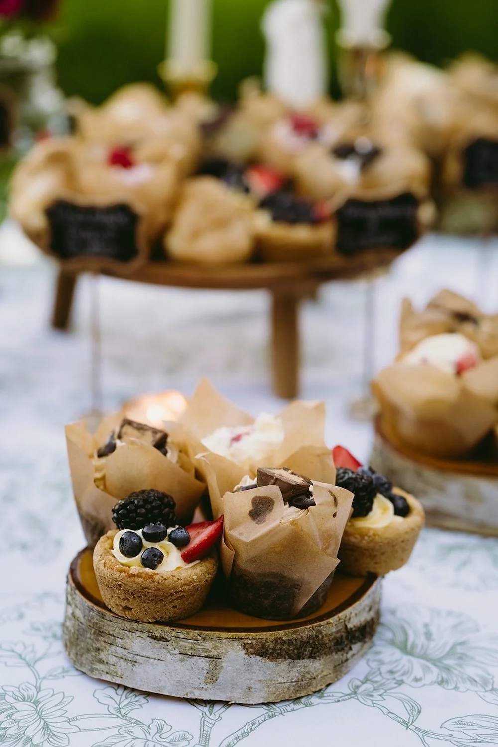 Mini deserts decorated throughout the table for guests. 