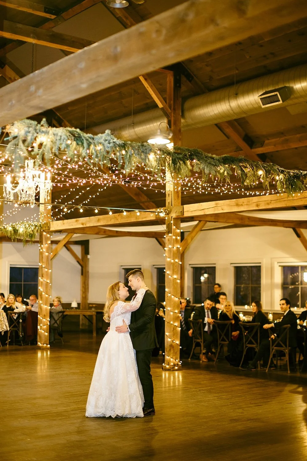 The bride and groom sharing their first dance together. 