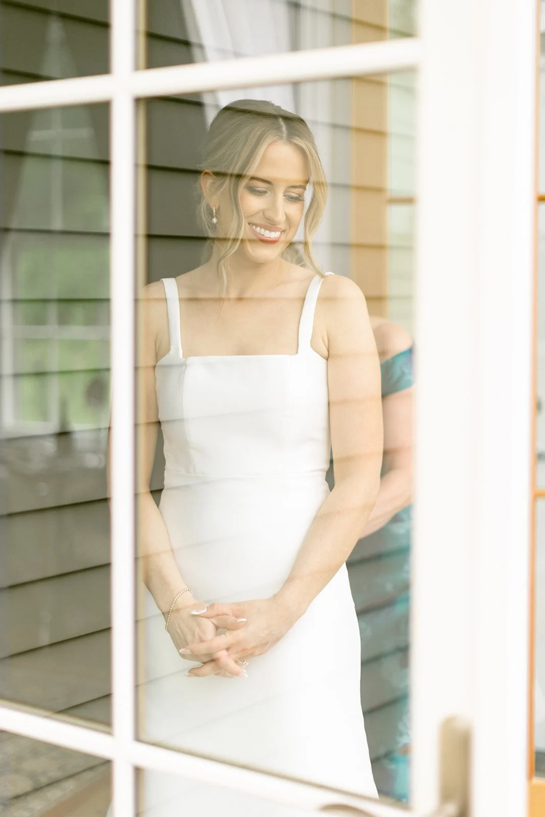 a bride getting ready for her wedding at the Inn at Taughannock Falls 