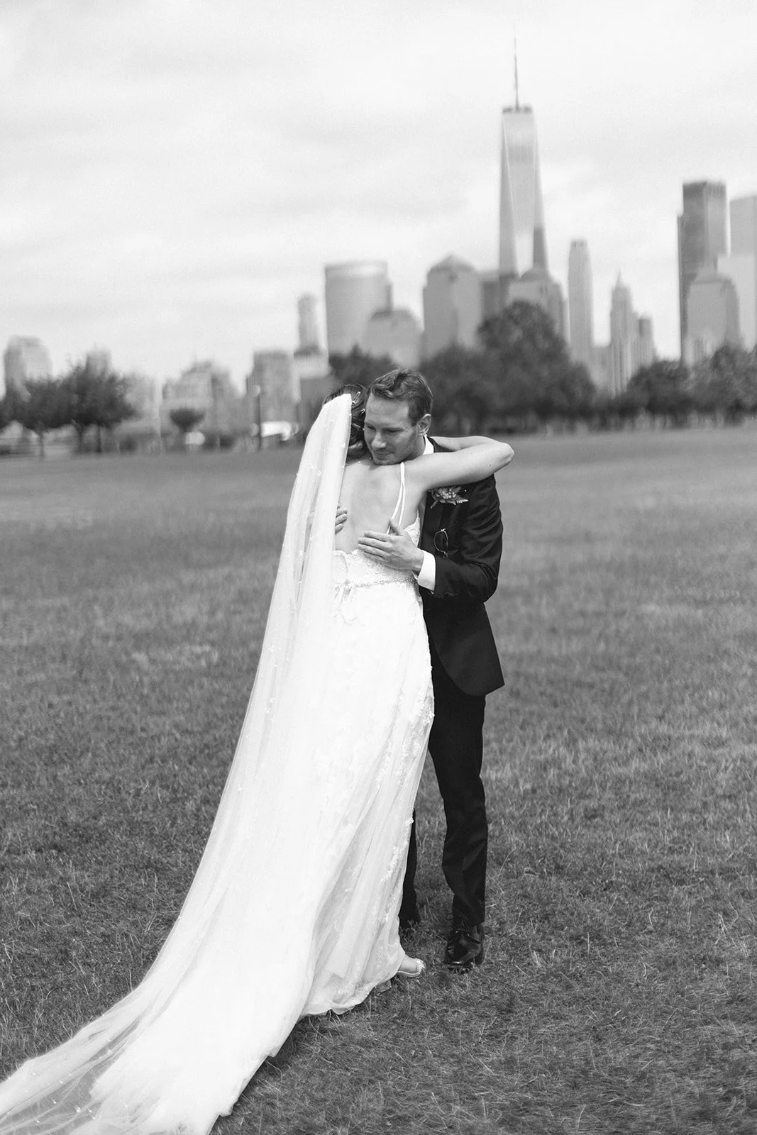 Romantic wedding first look with bride and groom sharing a private moment