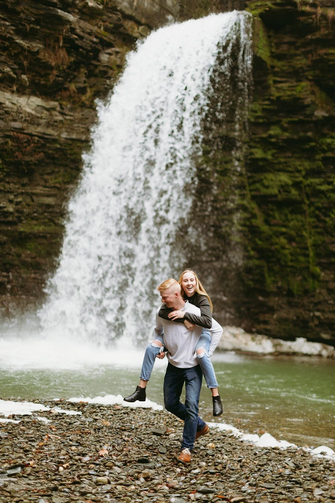 Winter engagement photos by waterfalls in Upstate NY at Havana Glen Park in Montour Falls, New York