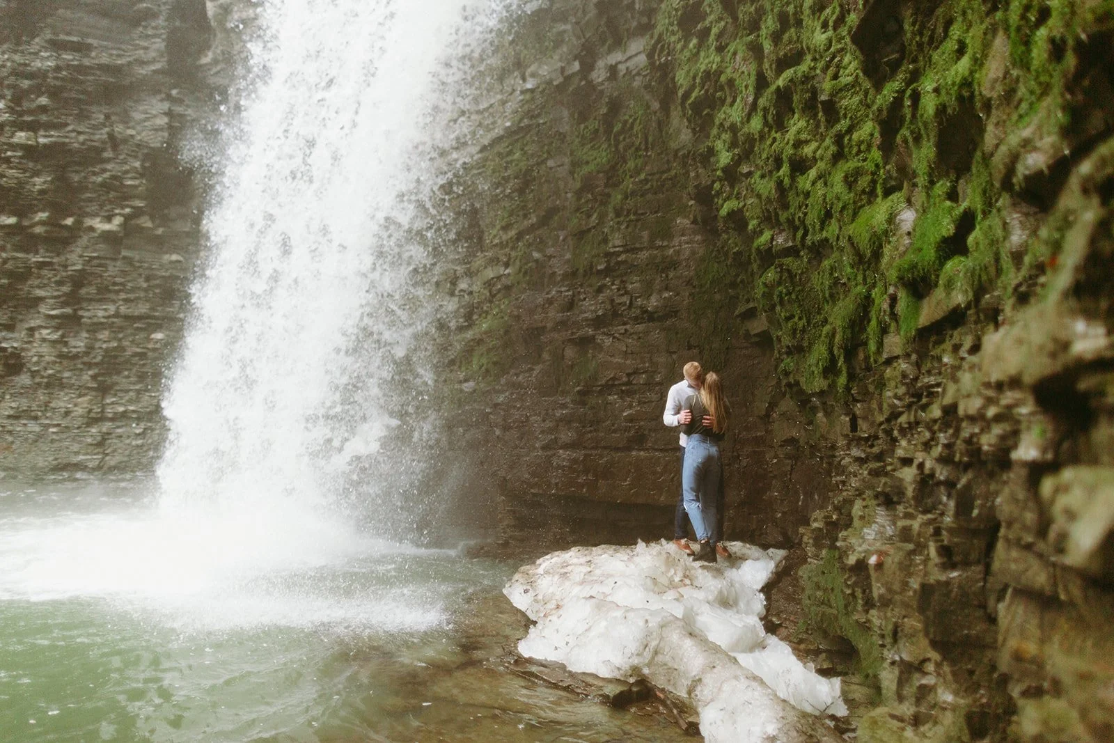 Winter engagement photos by waterfalls in Upstate NY at Havana Glen Park in Montour Falls, New York