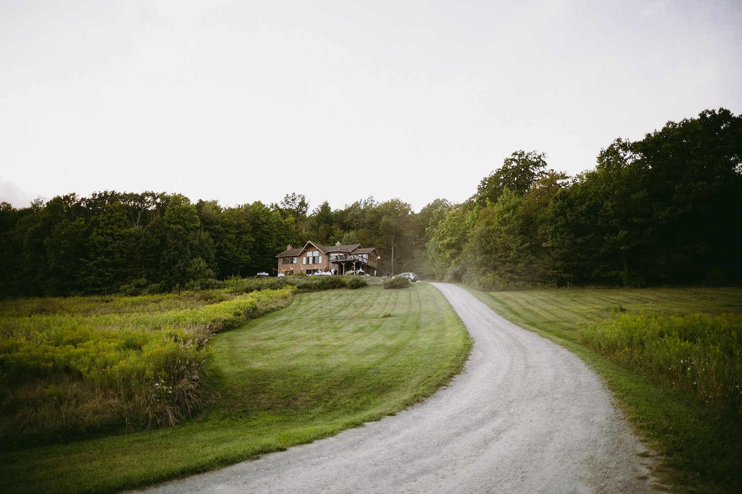 View of the childhood home and wedding venue for the whimsical wedding.