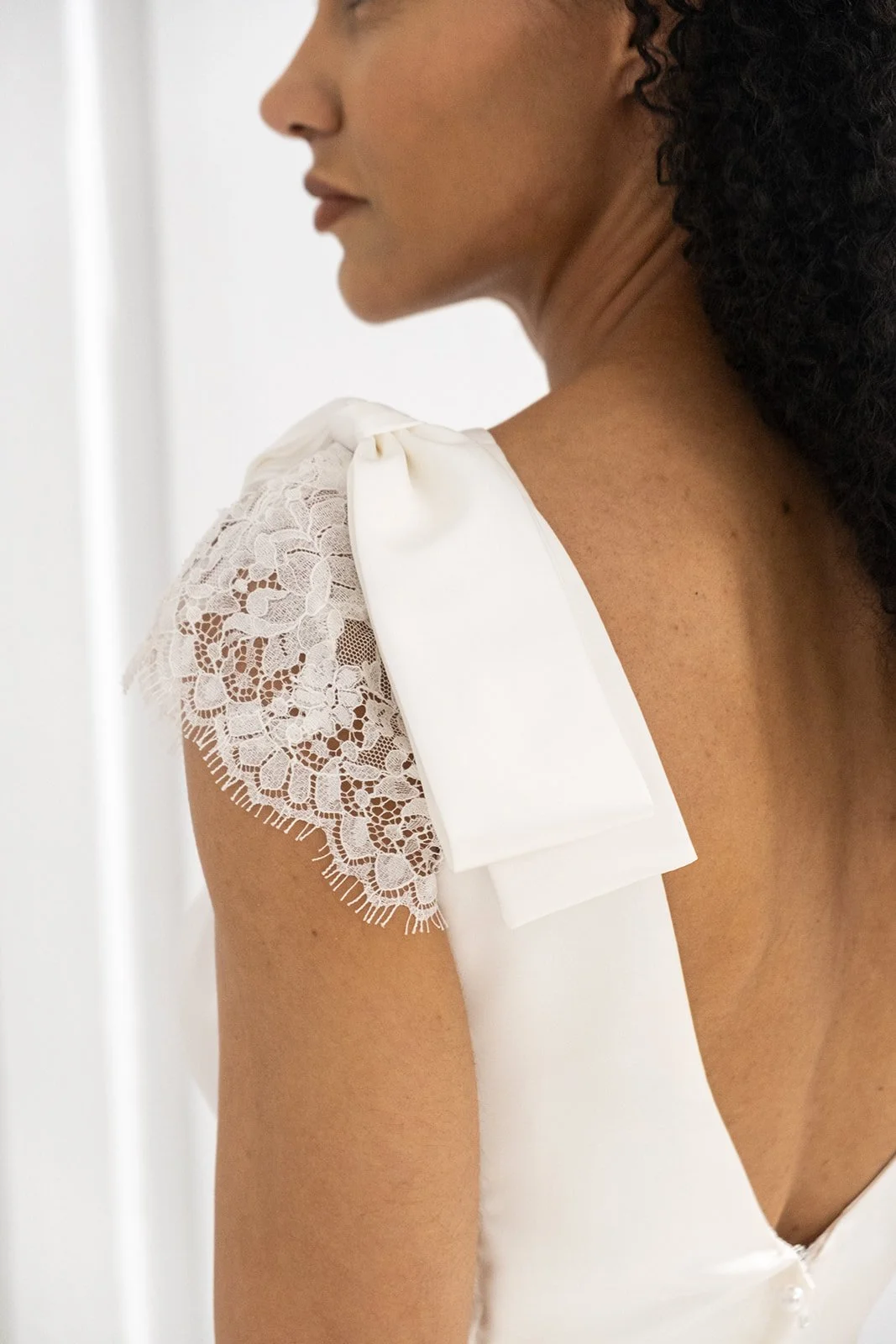 Catherine with Cluny lace cap sleeve and flat shoulder bow