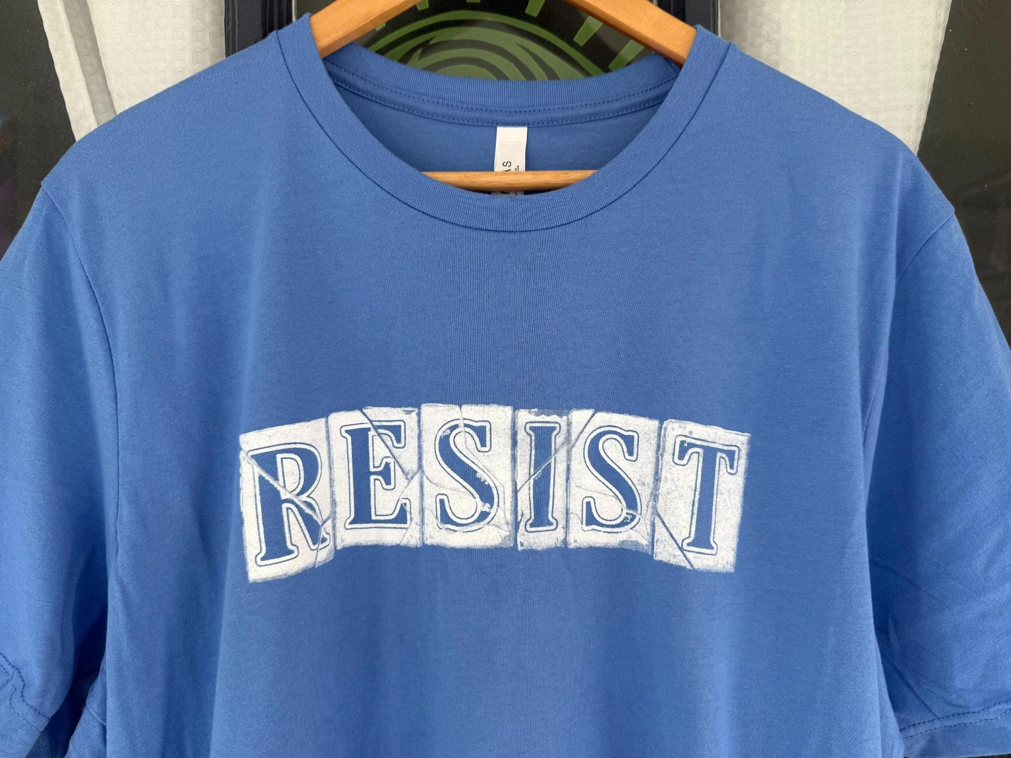 RESIST BY Kingfisher