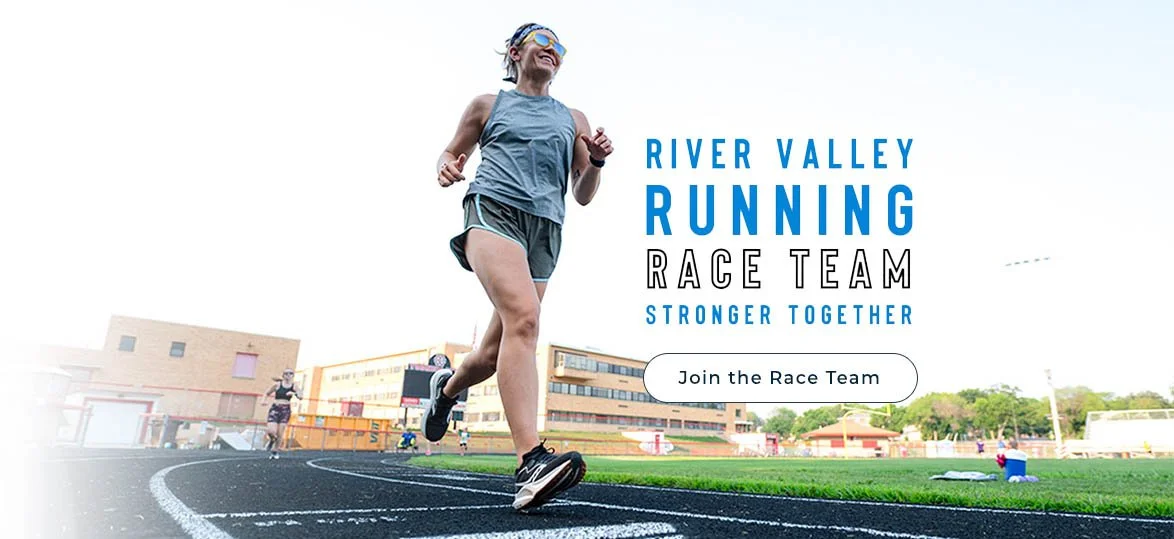 A young girl running on a track at a sports field with a smile, blue sky, and buildings in the background, promoting the River Valley Running Race Team.