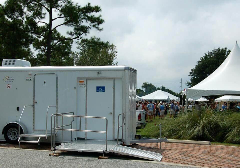 ada-plus-two-stall-restroom-trailer-texas-festival-landscape.jpg