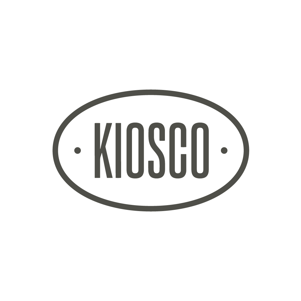Logo for Kiosco with a black background and gray oval outline