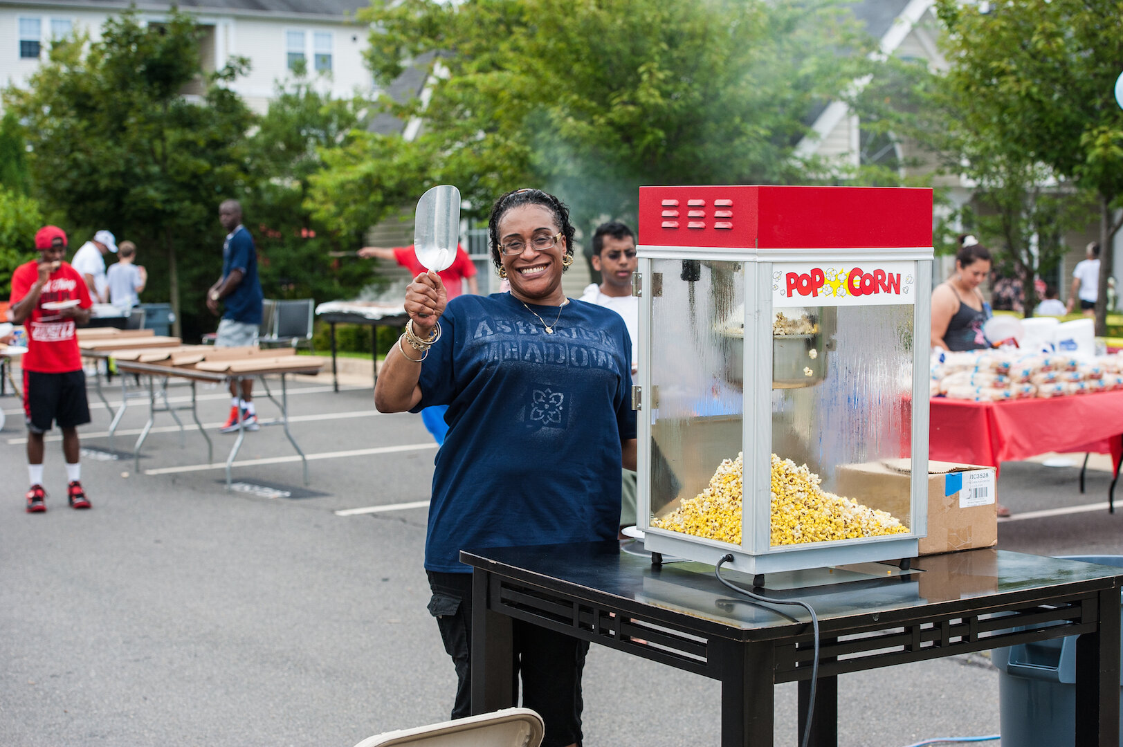  Popcorn for everyone! Ashburn Meadows neighbors come together at a community event. 