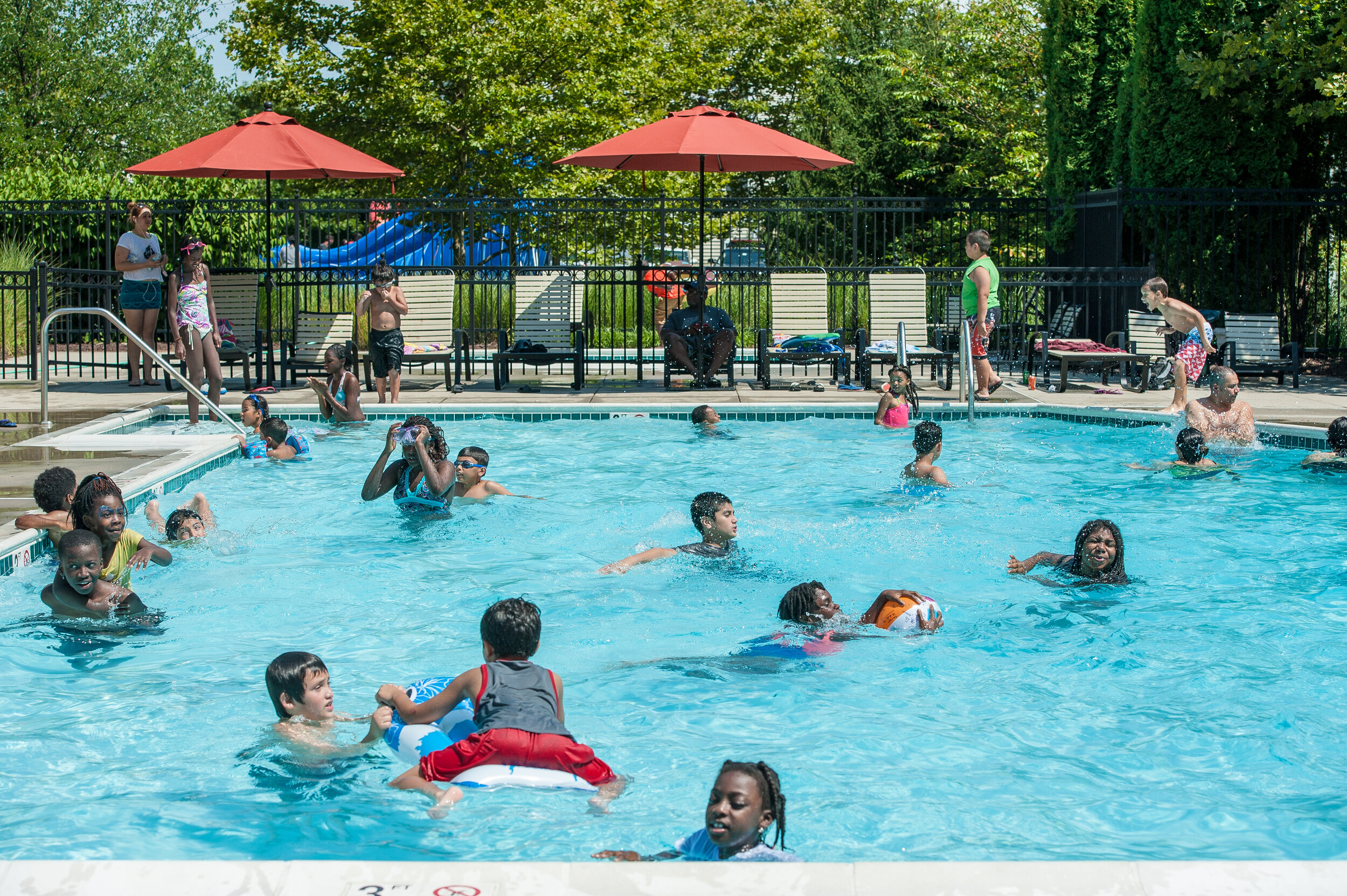  Families enjoy a nice pool day at Ashburn Meadows. 