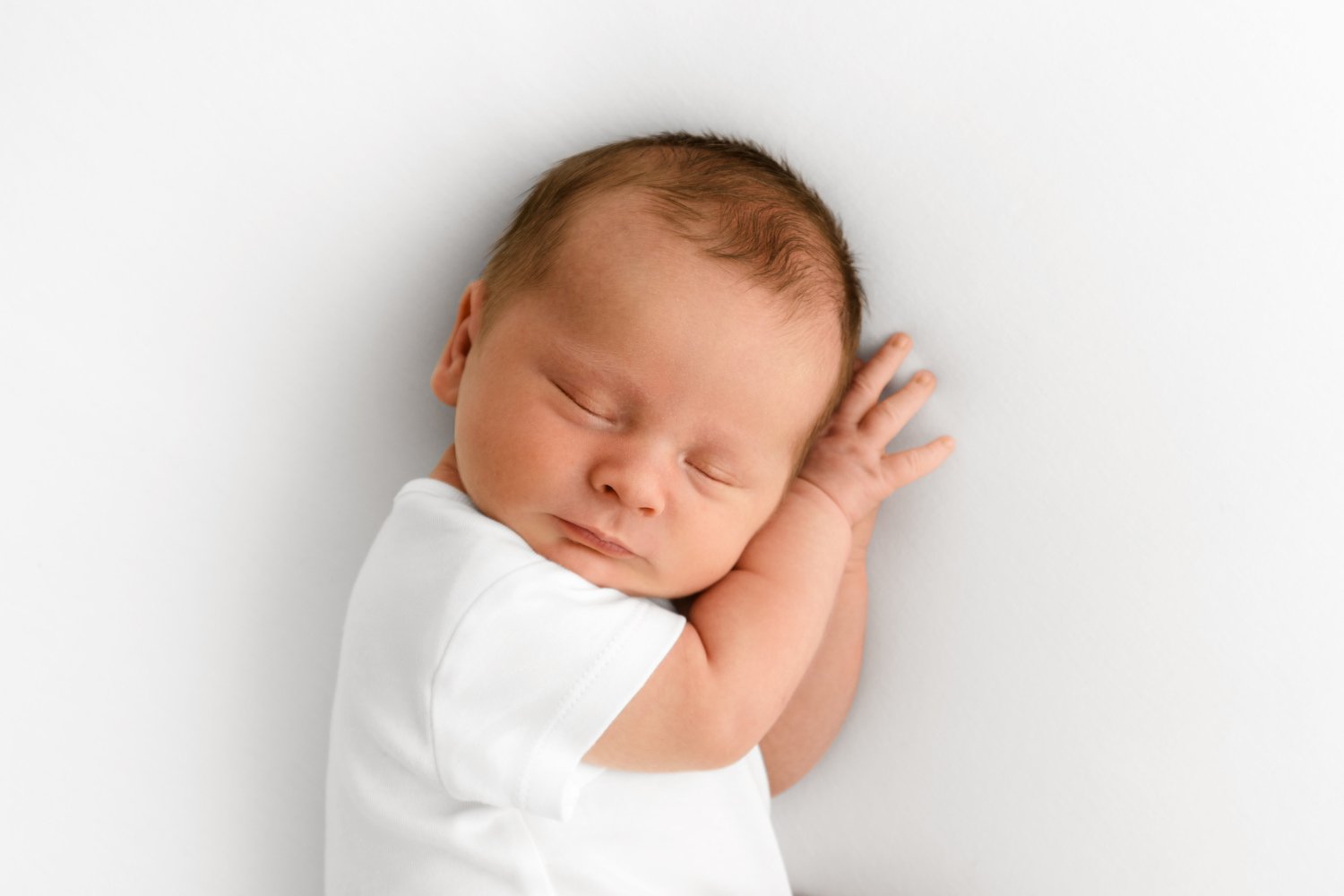 14 day old newborn baby sleeping naturally at Mabel and Moose studio Monifieth Dundee