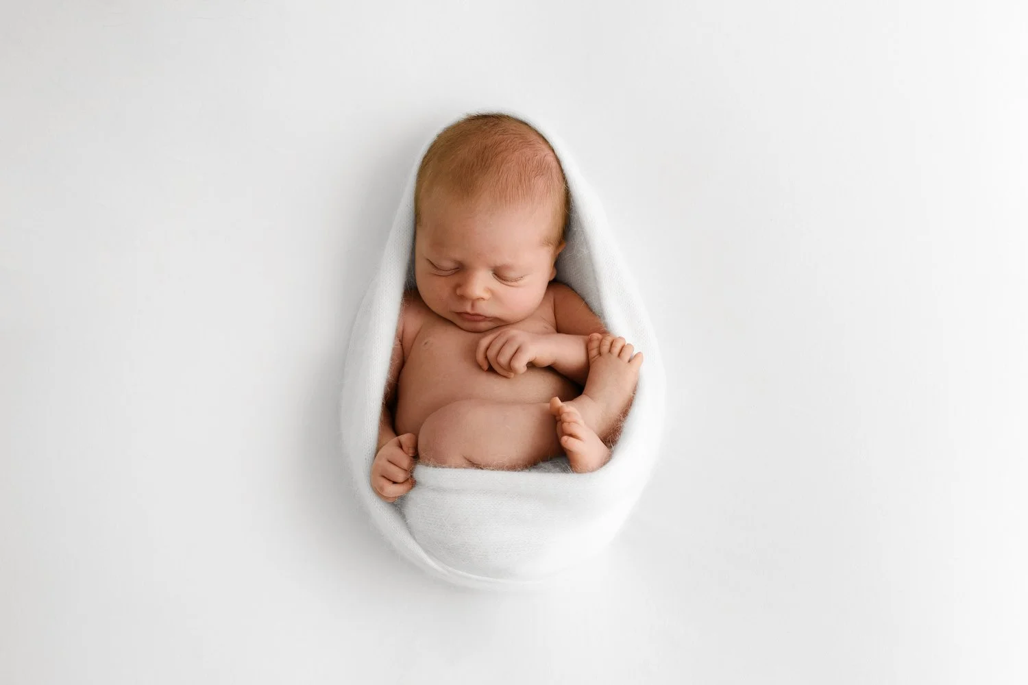 22 day old sleeping newborn baby photographed at Mabel and Moose studio Dundee