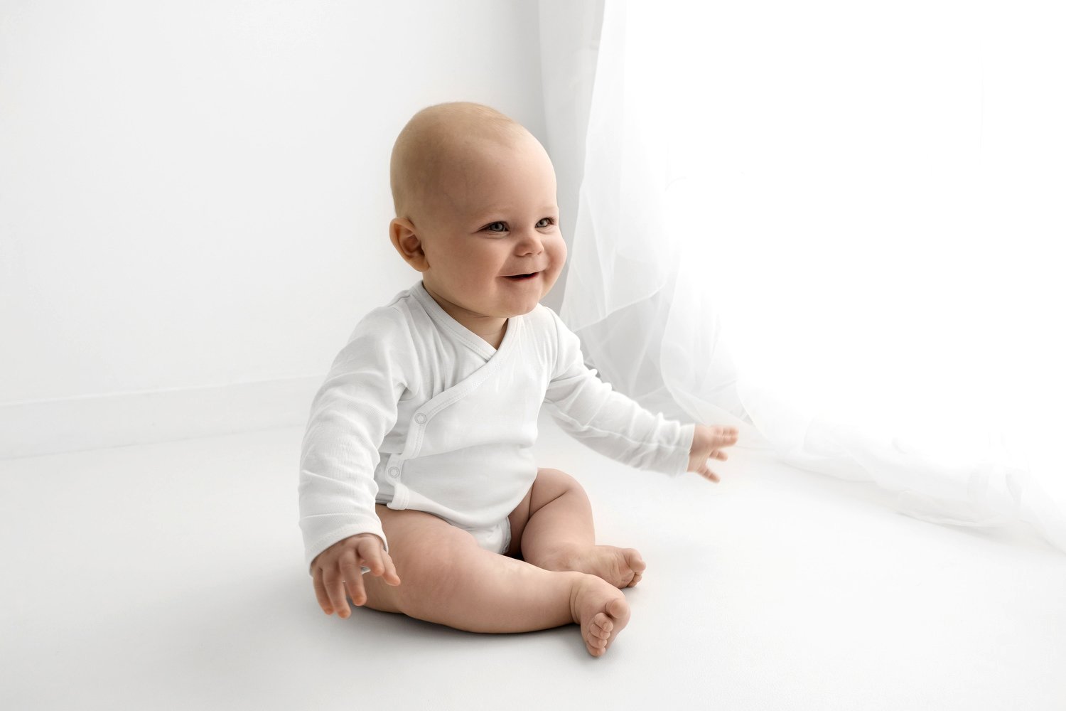 Kimono style white baby bodysuit for newborn photography session at Mabel and Moose Dundee