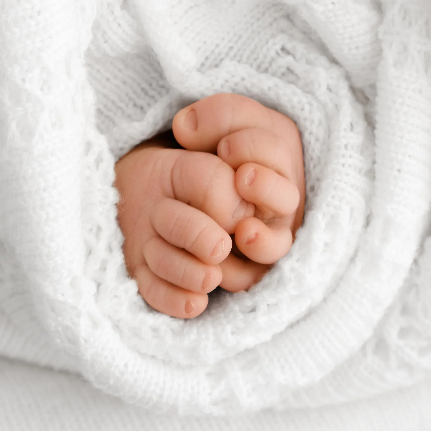 Close-up of newborn baby toes at Dundee studio