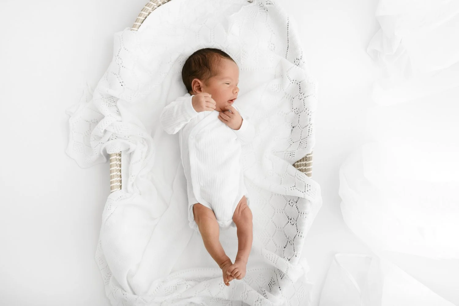 Textured white baby bodysuit on newborn baby at Mabel and Moose studio Dundee