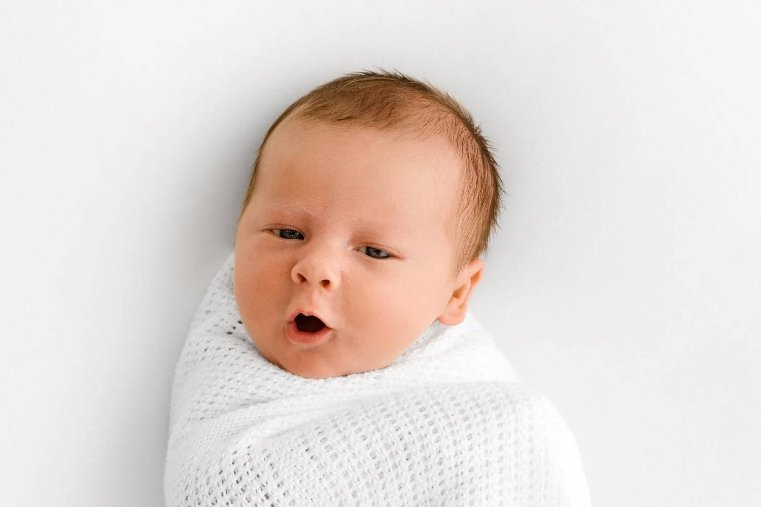 14 day old newborn baby pouting at Mabel and Moose studio Monifieth Dundee