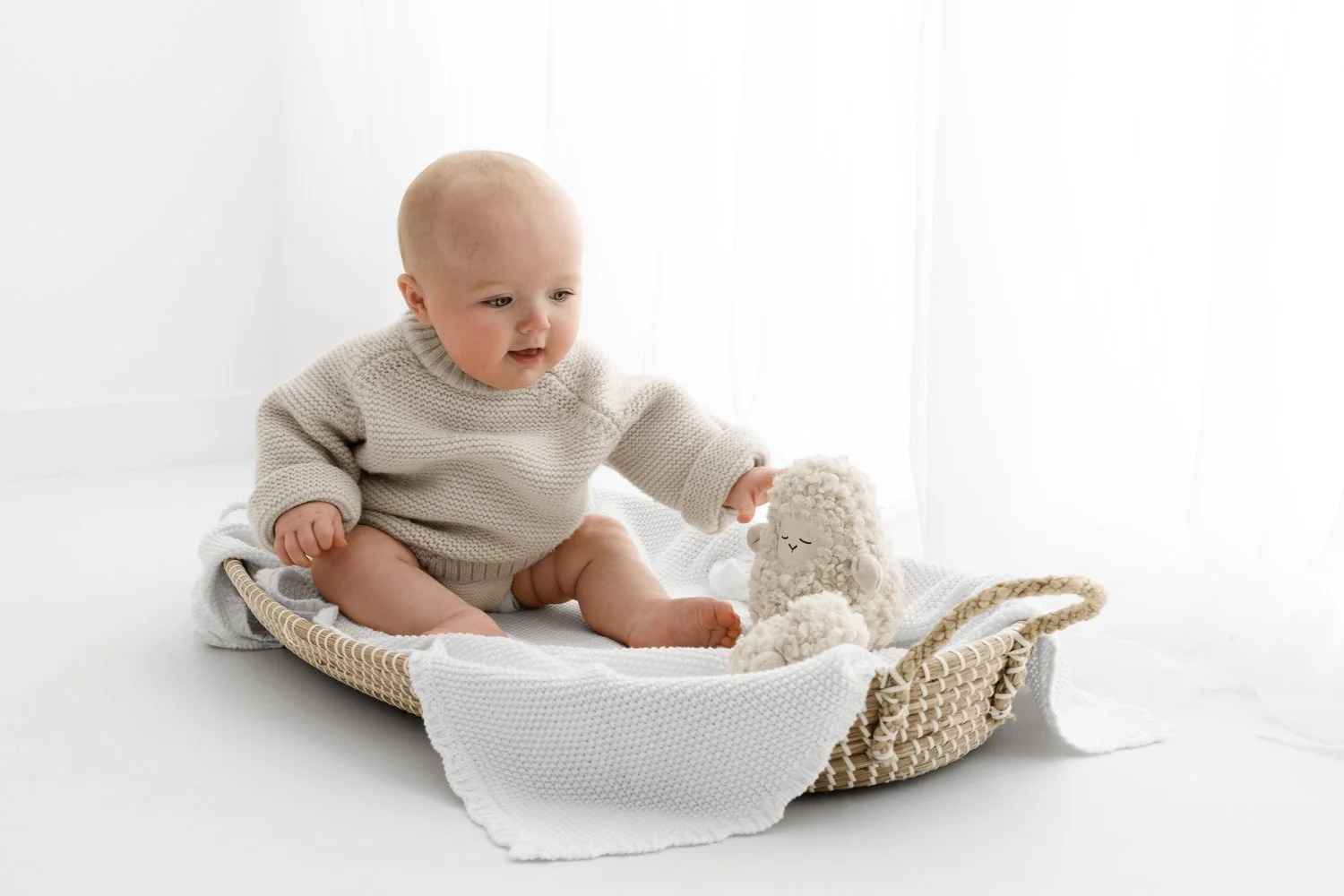 6 month old baby sitting naturally at photoshoot Mabel and Moose Dundee