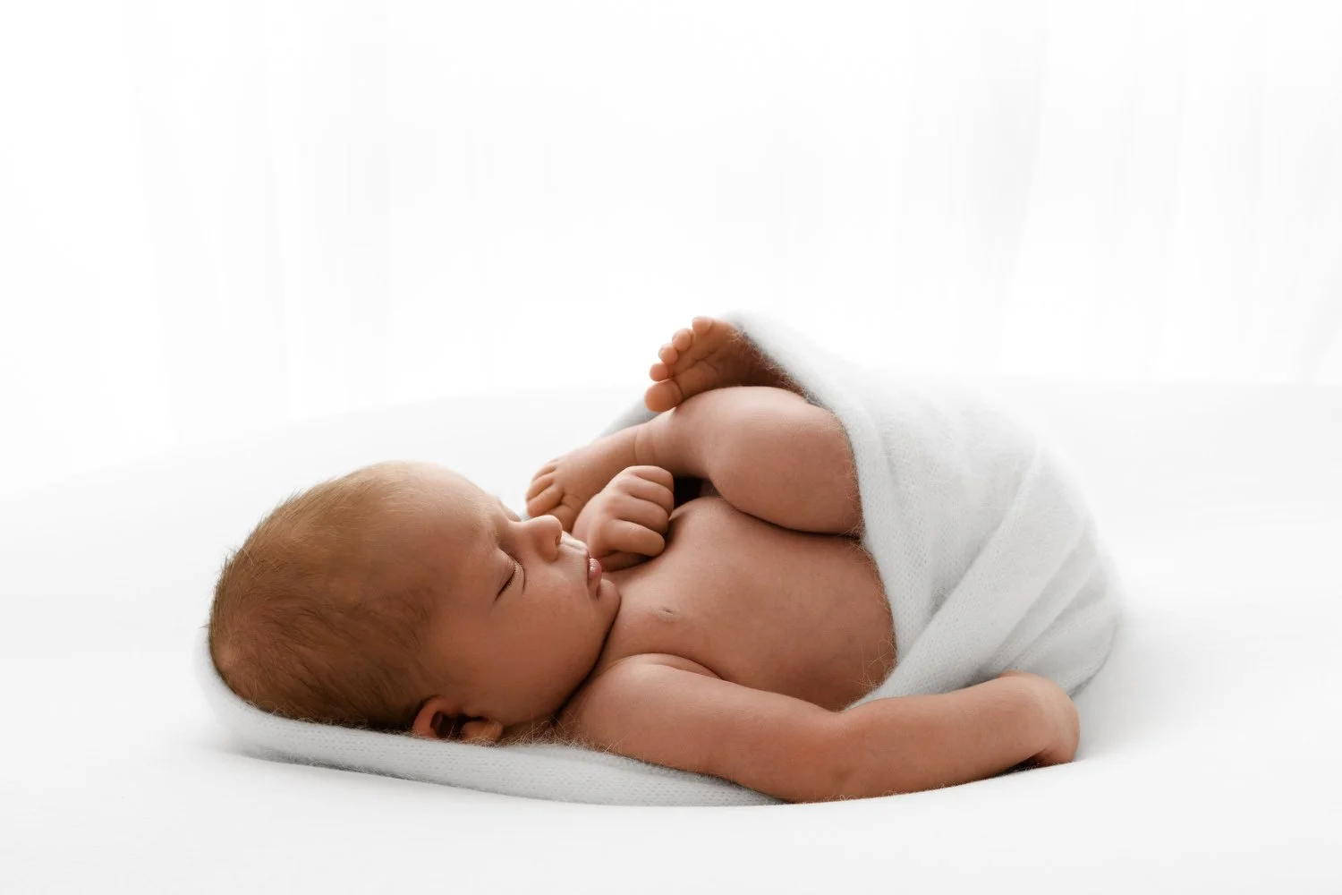 22 day old sleeping newborn baby photographed at Mabel and Moose studio Dundee