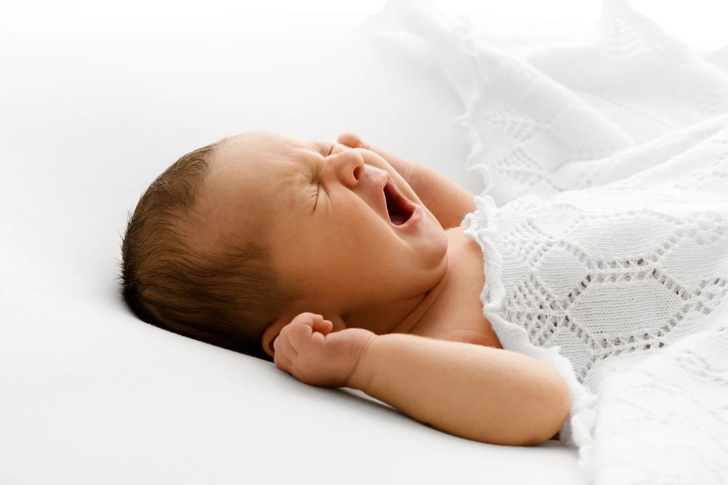 14 day old newborn baby yawning at Mabel and Moose studio Monifieth Dundee