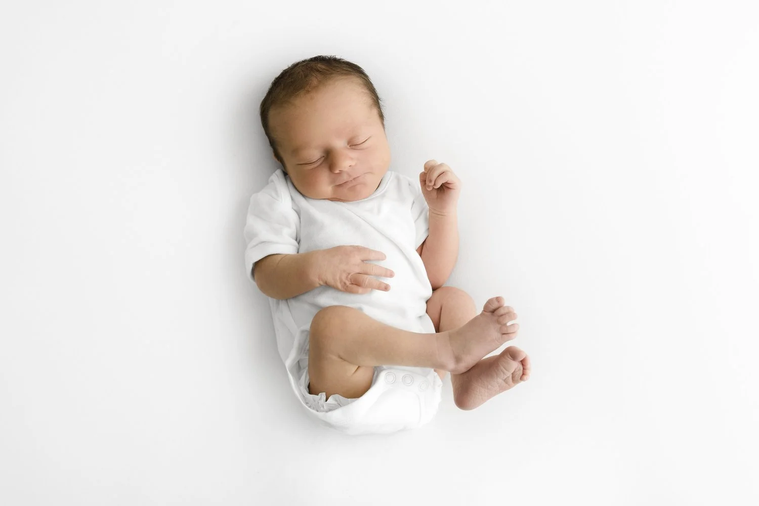 High quality white baby vest for newborn photoshoot at Mabel and Moose Dundee