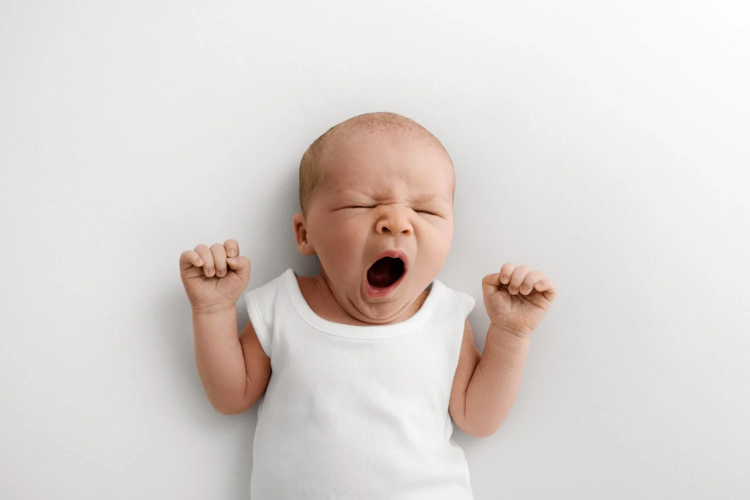 newborn baby yawning at a natural photoshoot at a dundee photographers