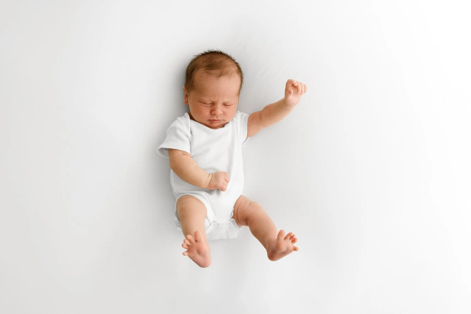 14 day old newborn baby stretching at Mabel and Moose studio Monifieth Dundee