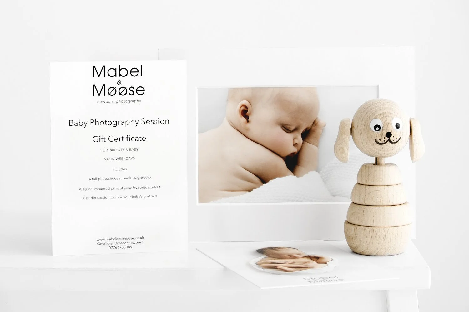Baby photoshoot gift voucher with mounted print and wooden toy at Mabel & Møøse Dundee