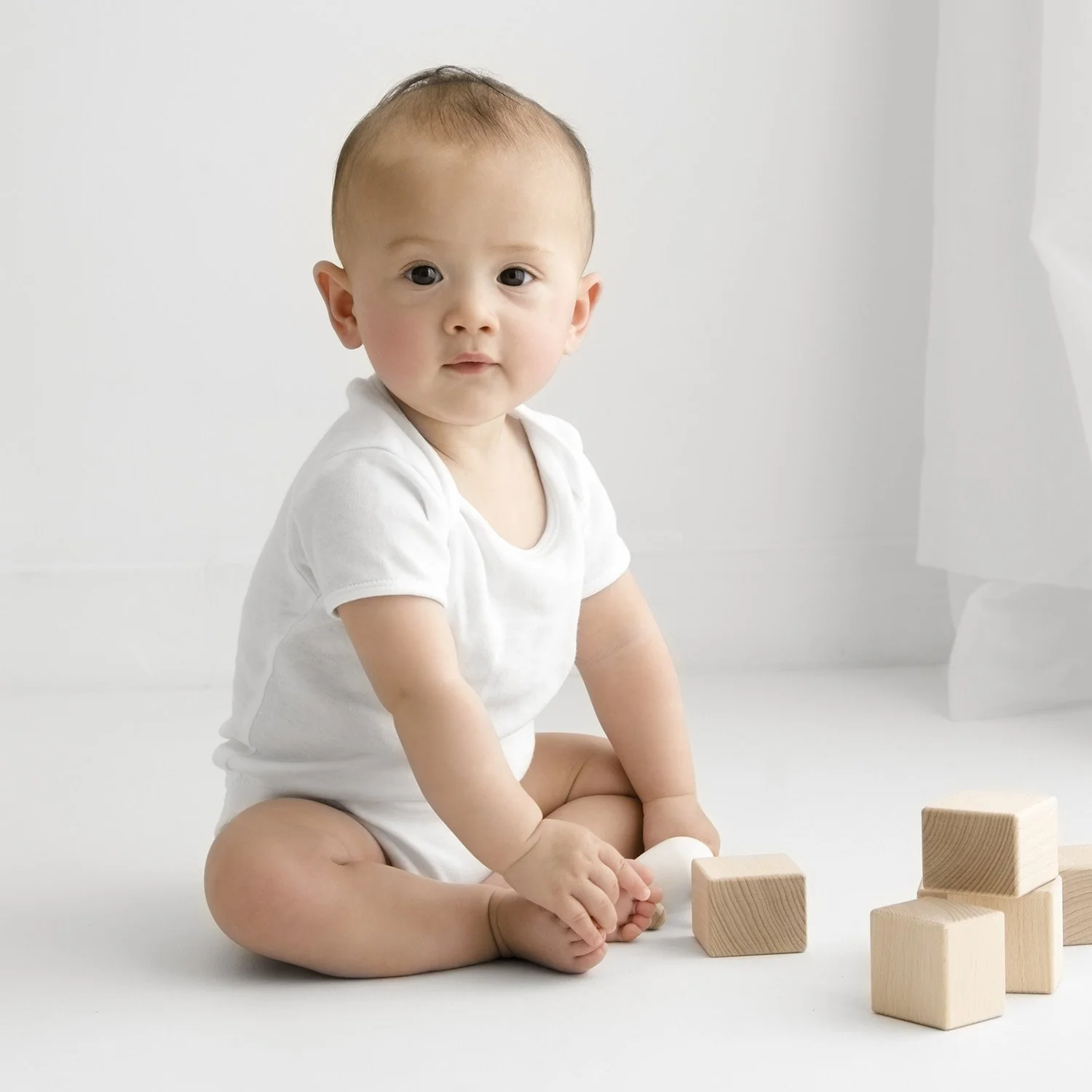 Sitting baby portrait at Dundee studio
