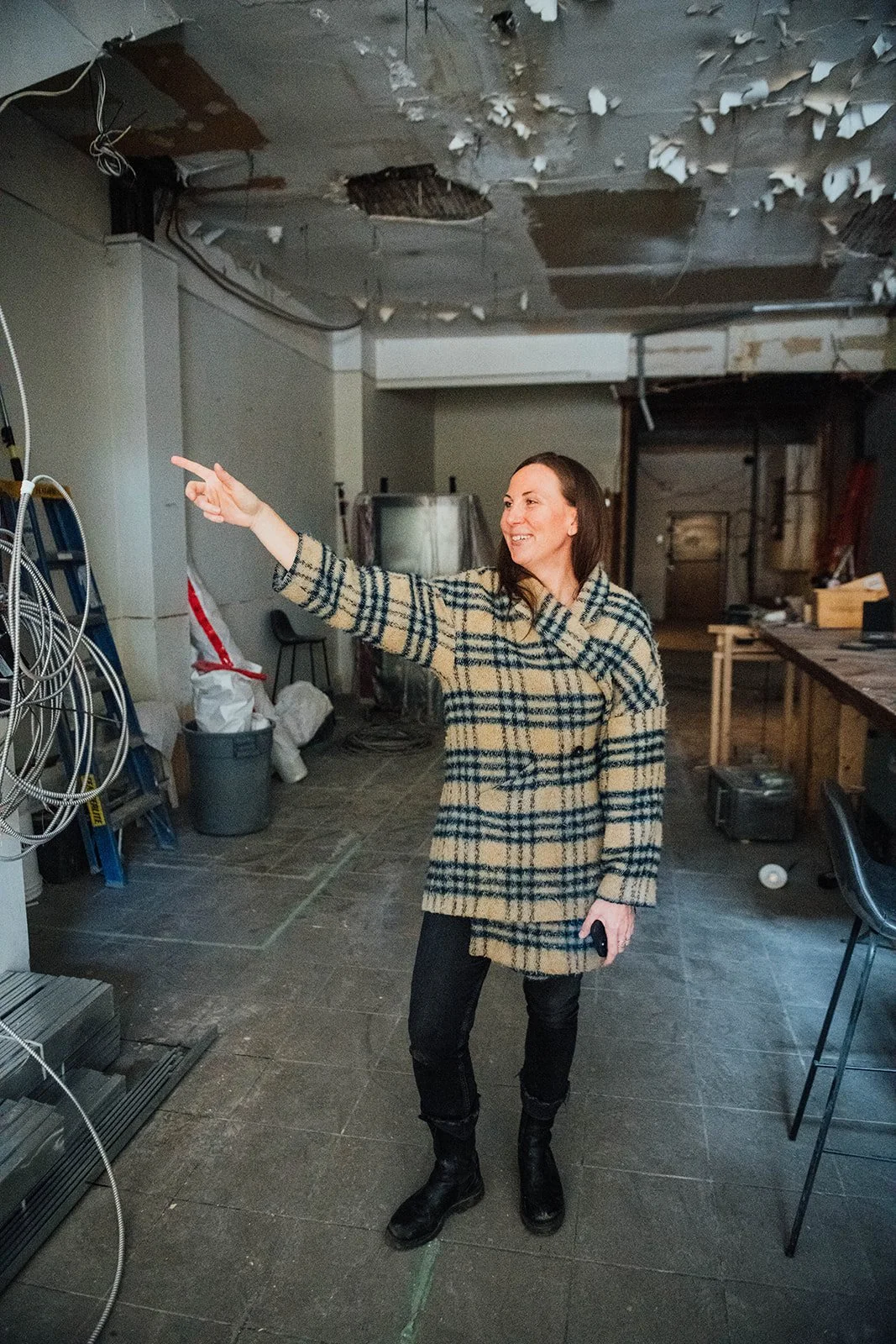  Lindsay Brennan surveys the space in its early stages of construction, envisioning what would become Bar Luz. 