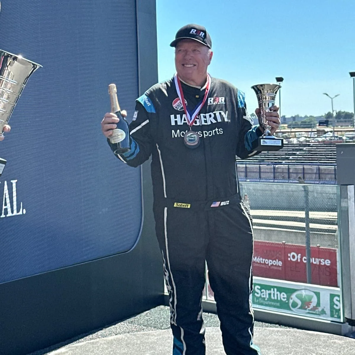 What better way to start the week than a photo of our own @buz.mccall on the podium at Le Mans for @historicsportscarracing @nascar Classic at the @lemansclassic event. So proud to have R3R on the podium at on one of the most famous tracks in the wor