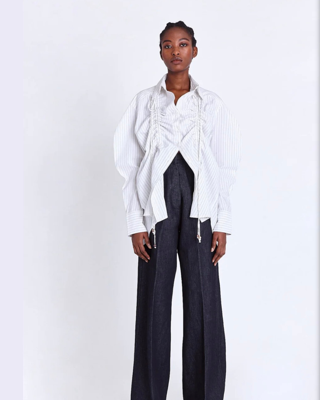 Female model wearing ASANTII Oversized Drawstring Shirt