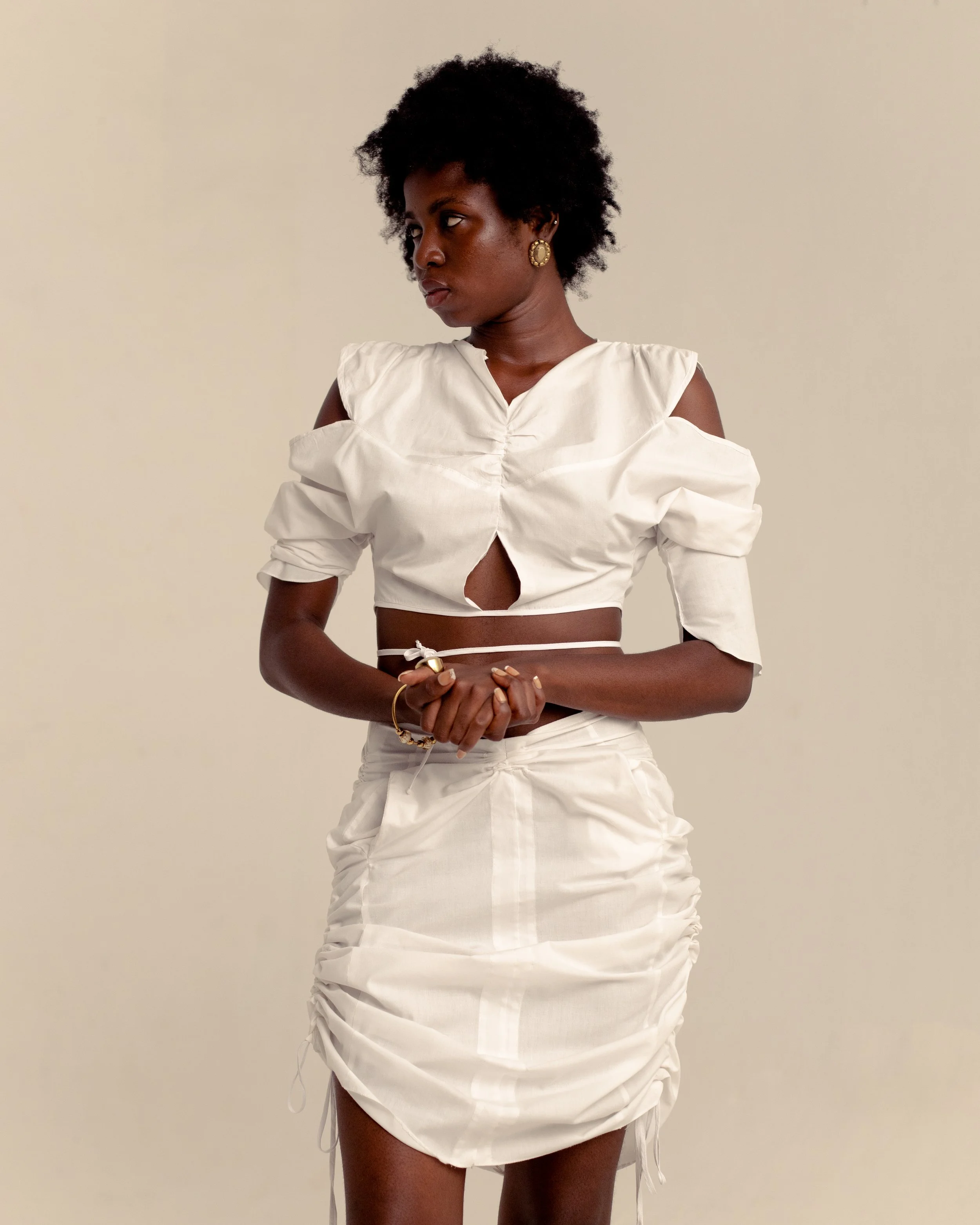 Female model wearing Bold Underlined Iris Skirt and Blouse | Bold Underlined fashion shoot