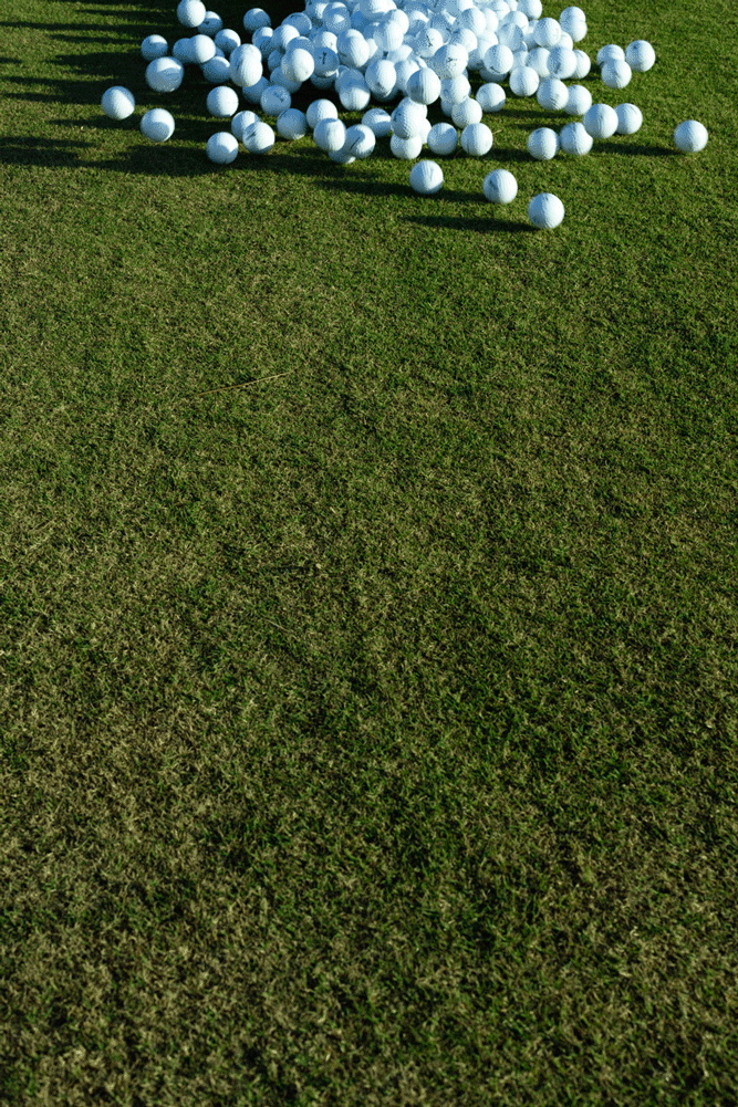  Gif of golf balls rolling toward camera. 