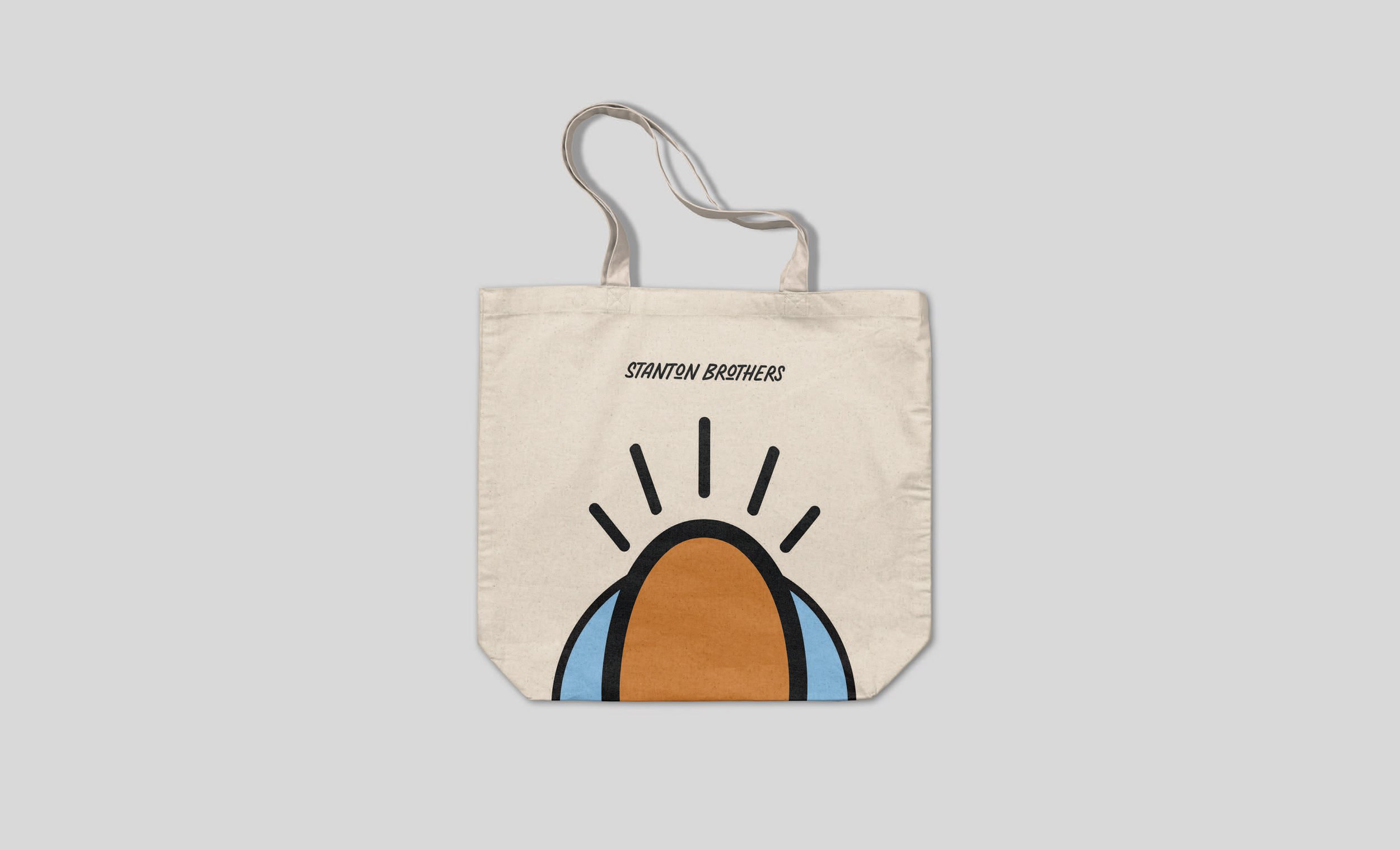  Stanton Brothers logo of an egg on a tote bag. 