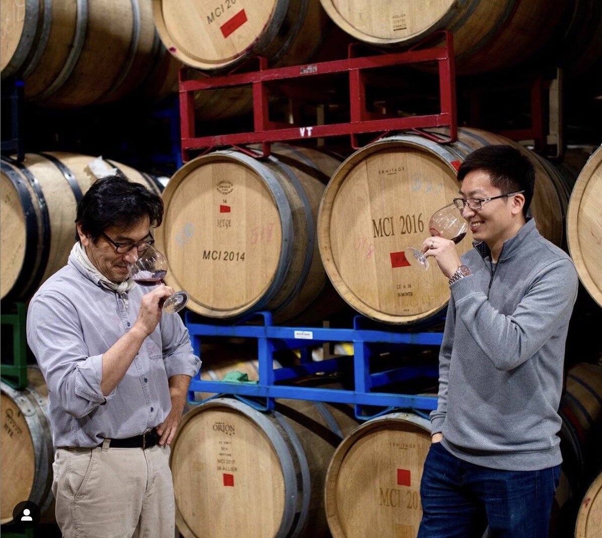 Winemaker Byron Kosuge (left) and George Zhang (right) tasting wine together 