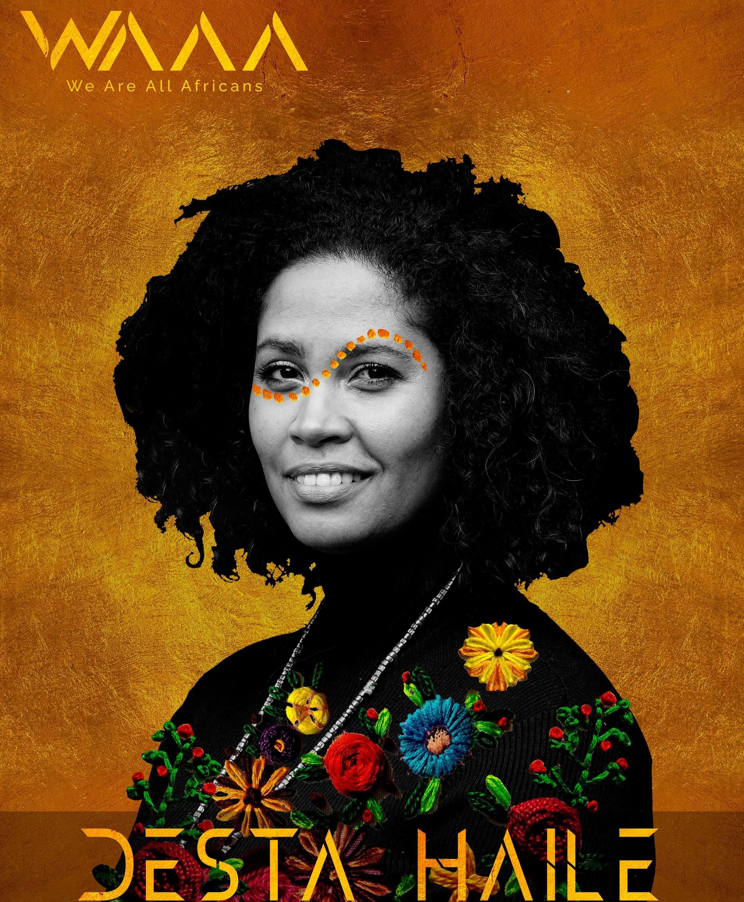 A black-and-white portrait of a woman with curly hair, smiling, with orange decorative dots around her eye, against a gold textured background. The top left corner has a yellow logo with the words "WAWA" and "We Are All Africans." The bottom features the name "Destha Haile" in orange stylized text. The woman is wearing a black top with colorful embroidered flowers and a necklace.