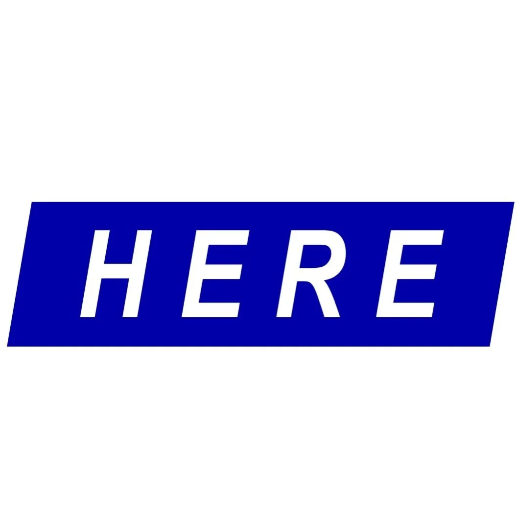 Text reading "HERE" in bold white letters on a blue background, with "Felix Art Fair 2024, Hollywood Roosevelt Hotel, Los Angeles, USA" in smaller black text below.