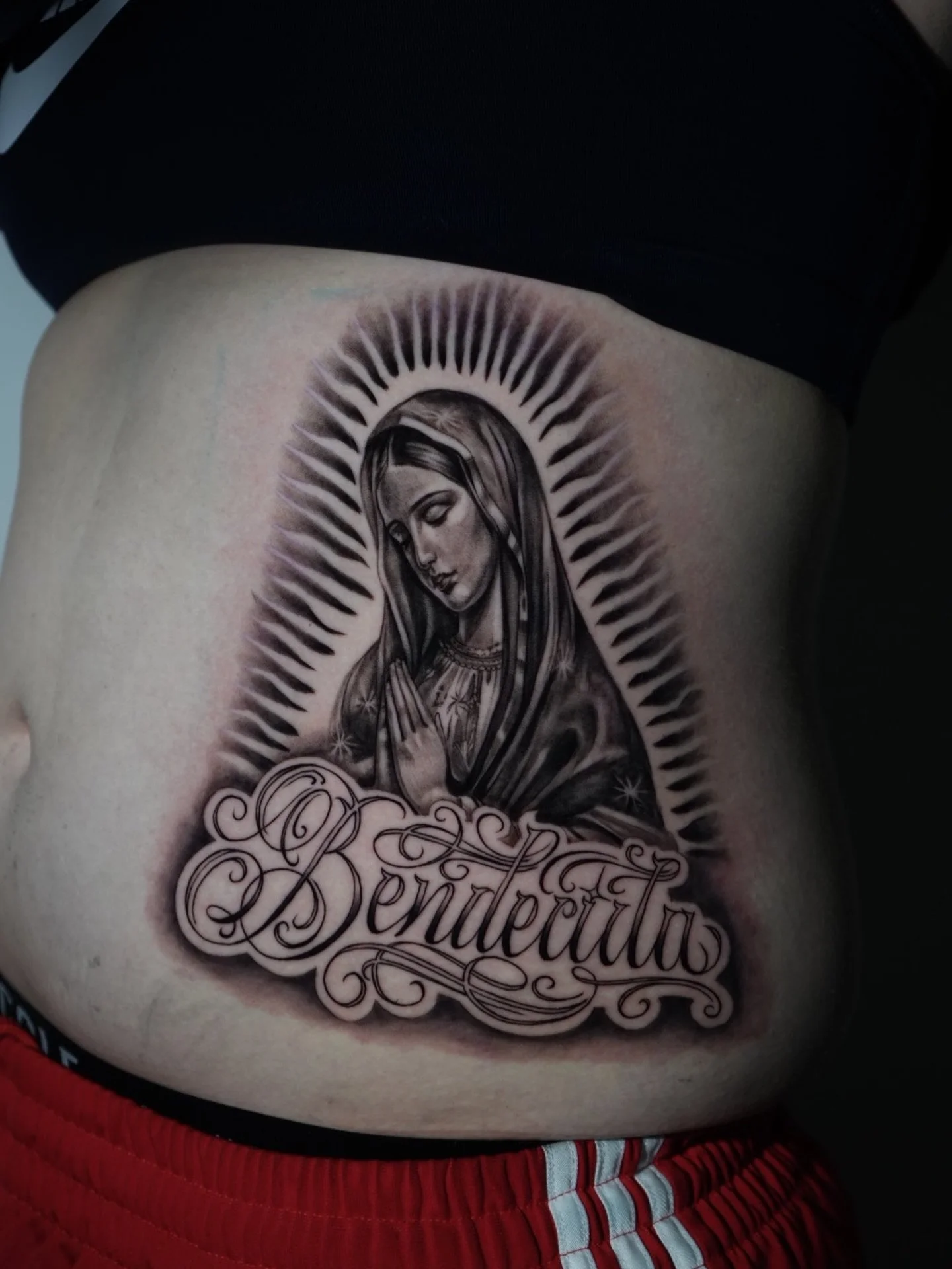 Custom Virgen de Guadalupe and lettering by @s0phia_tattoos 

Who do you got winning the game today ? 🇲🇽 or 🇰🇷

#virgindeguadalupe #virginmarytattoo #stomachtattoo #womentattooartist #lettering