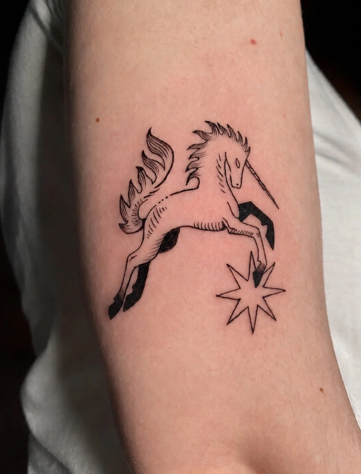 Unicorn 🦄by our apprentice artist @maeowl 

#unicorntattoo #fineline #illustrativetattoos #whimsy