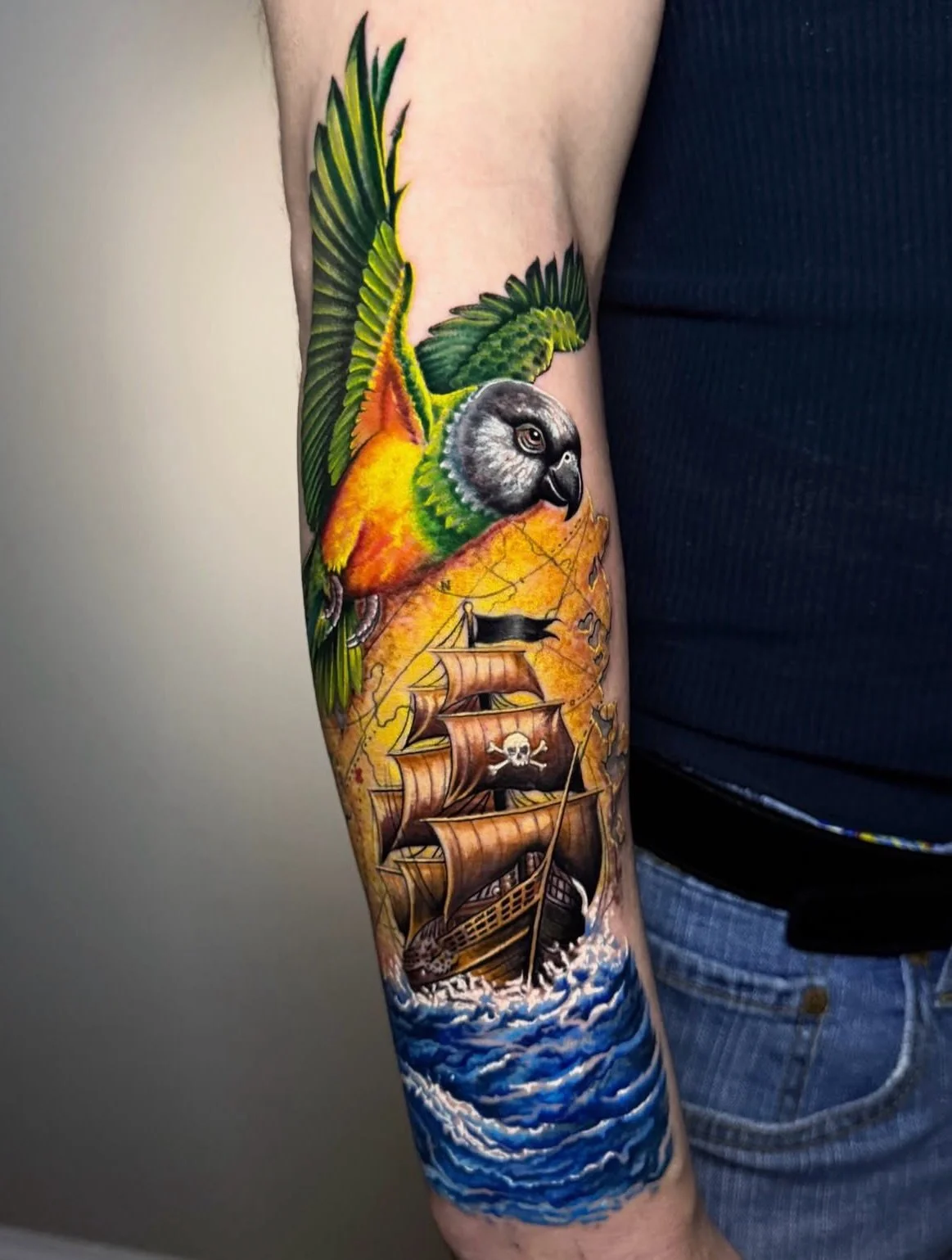 Parrot and Pirates 🦜🏴&zwj;☠️ by @pablo_barraggan 

who&rsquo;s ready for a color tattoo? Email us directly today! 

#colortattoo #realismtattoo #piratetattoo #colorrealism #colortattooartist