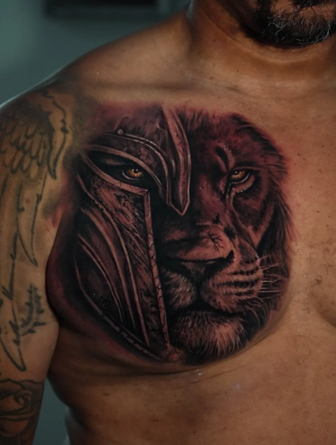 A classic . . . lion warrior 🦁 by @tattsbyethan_ 

#chestpiece #liontattoo #blackandwhite #realism #realismtattooartist