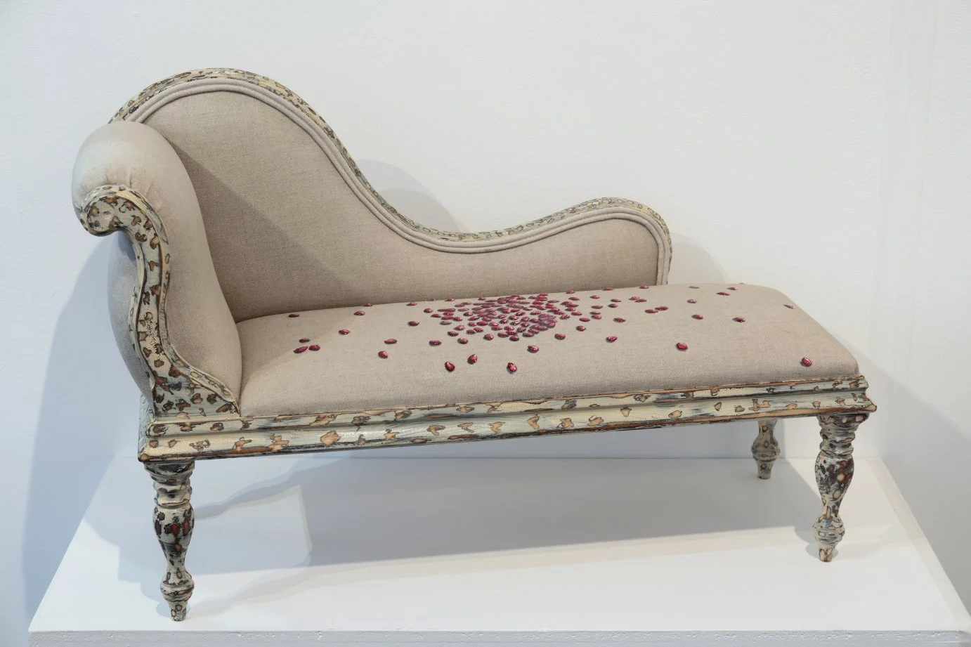 Pre-shrunk, 2025. Meaghan Shelton. Found object (doll's chaise), Belgian linen, acrylic, oil & resin. 700mm L x 260mm W x 430mm H. .JPG