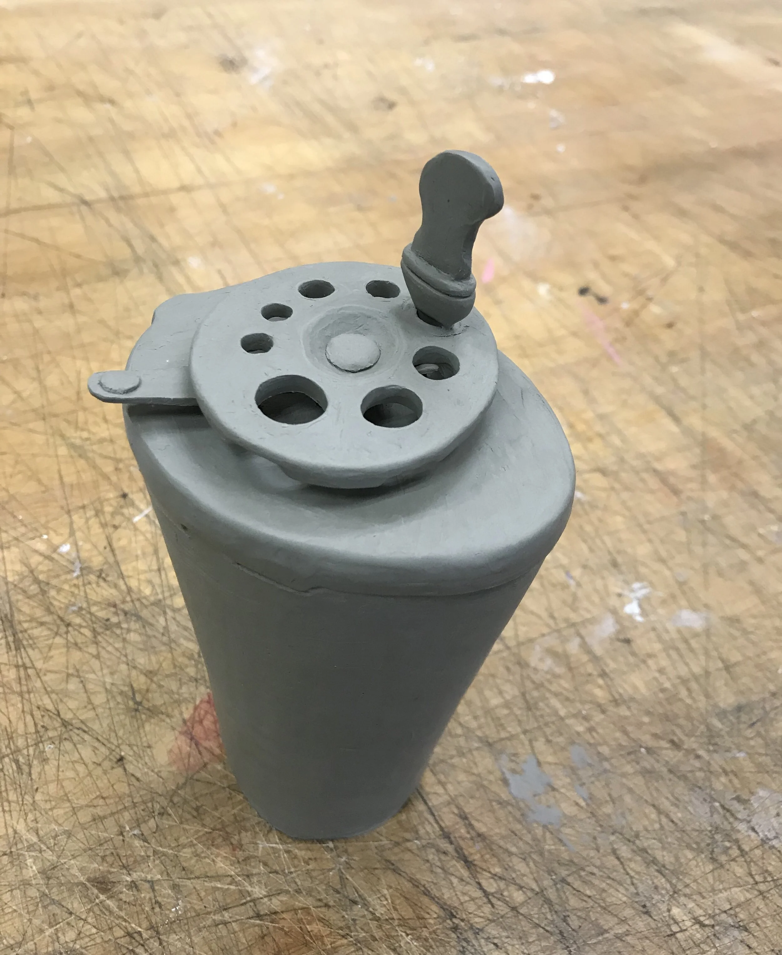*© Morphing (cup + pencil sharpener) / roma plasticina clay / 8x2in / 2017