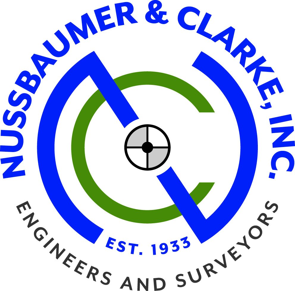 NussbaumerClarke_logo_main_CMYK.JPG
