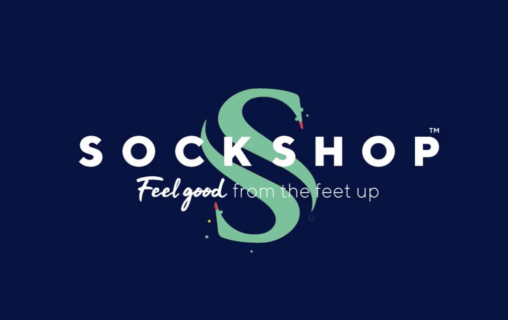 Logo for Sockshop with a stylized sock shaped like an S, featuring a snake tongue and snake-like details, with the tagline "Feel good from the feet up" on a dark blue background.