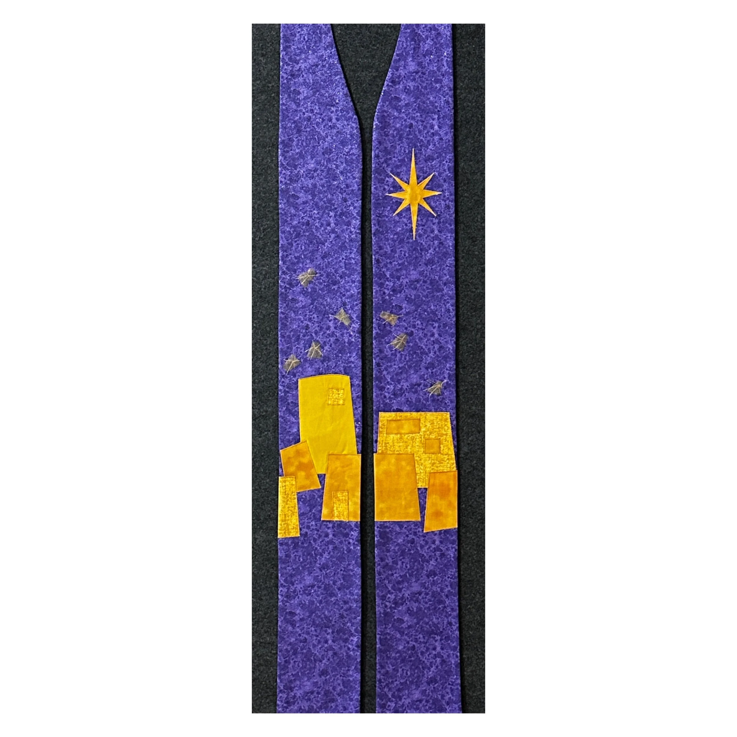 A purple clergy advent stole at carrot top studio is handmade with beautiful, artistic details.