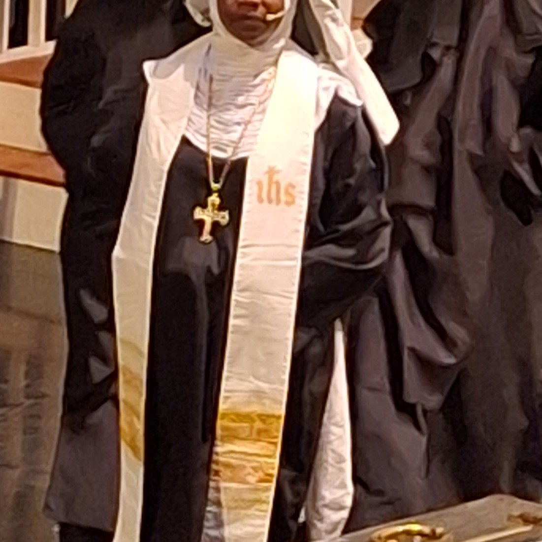I received this photo from a client who is currently a chaplain in Kenya. He wrote --

I wanted to share a fun picture with you that I took last night. The picture is one of my students wearing the stole that you made for my ordination. She is wearin